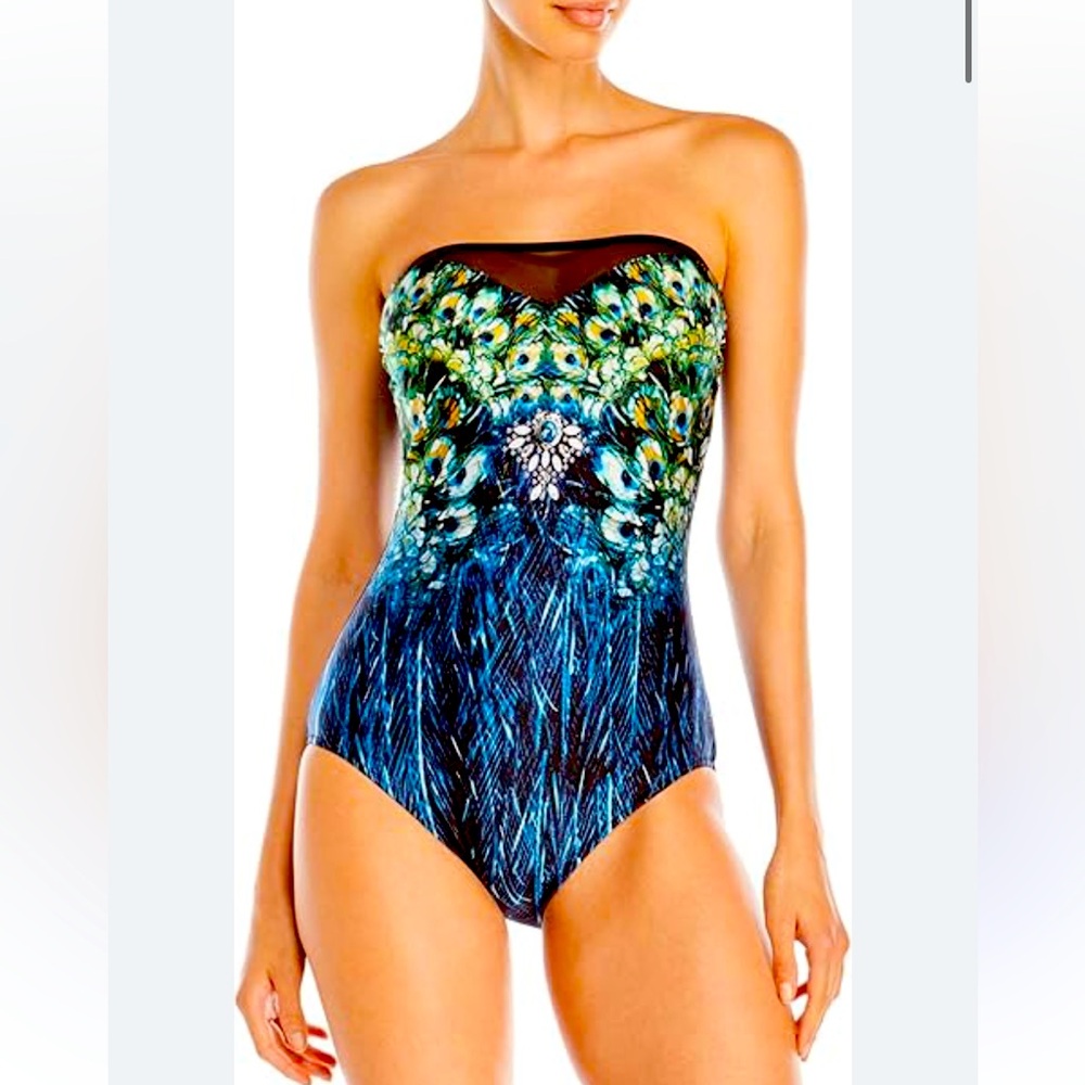 Gottex's most exotic and interesting designs. powerful feathers of the peacock